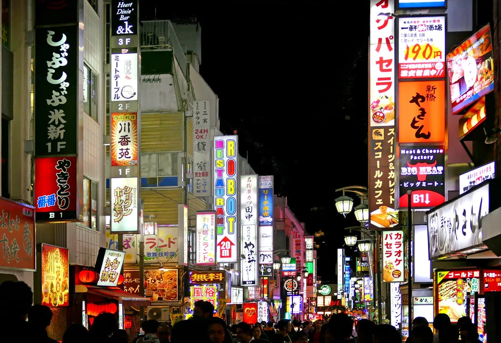 Dense neon nightlife — the immersive world fans want
